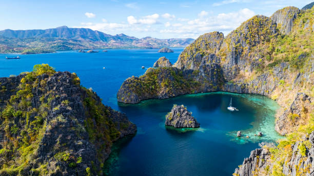 istock Coron, Palawan, Philippines, aerial view of beautiful lagoons and limestone cliffs. 2155682462
