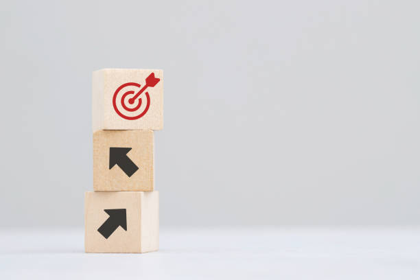 istock wood cube block target with Growing sales of online e-commerce products 2155682934