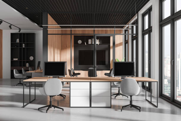 istock Modern office interior with glass meeting room and coworking space, window 2155684210