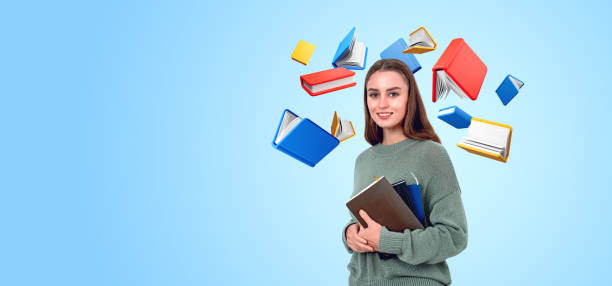 istock Smiling woman with notebook and flying cartoon books on copy space background 2155684214