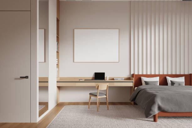 istock Beige master bedroom interior with table and poster 2155684267
