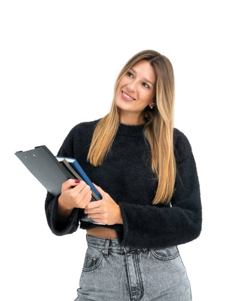 istock Woman student with clipboard and notebook in hands, isolated white background 2155684303