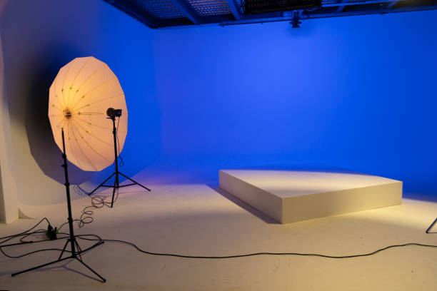istock Photography studio equipment umbrella on a deep blue background. 2155685830