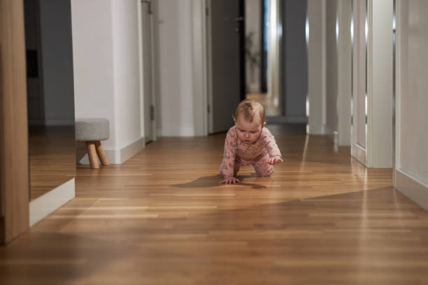 istock Little baby crawling during the night 2155685873