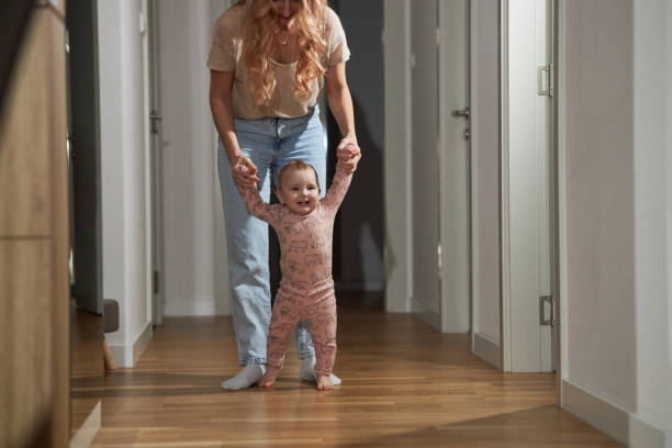 istock First steps of my baby 2155685903