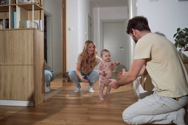 istock First steps of our baby 2155685923