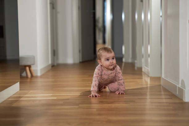 istock Little baby crawling during the night 2155685932