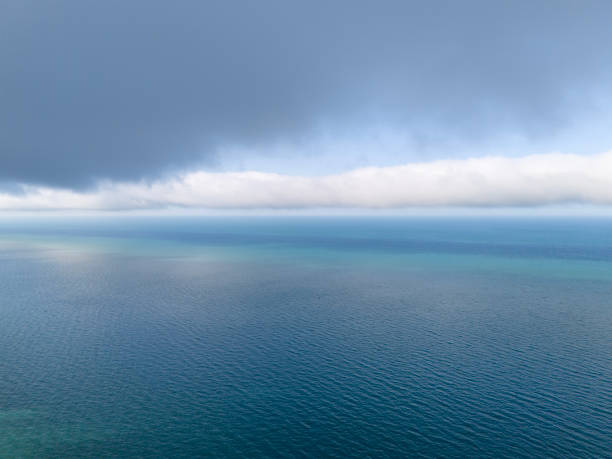 istock Aerial view of endless sea and cloudy sky. 2155687377