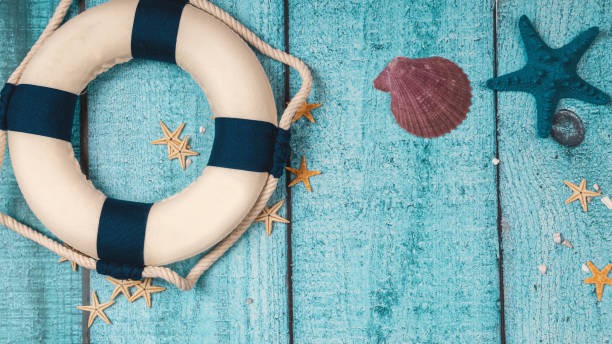 istock Beach accessories on blue board - summer holiday. Flat lay. Top view. Copy space 2155688271