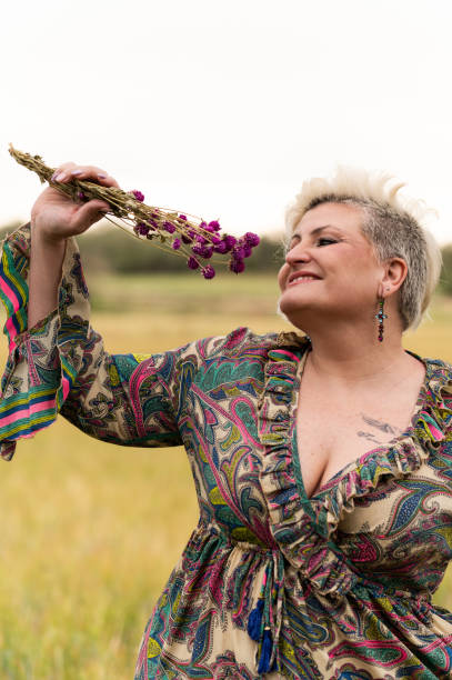 istock mature woman in field 2155688320