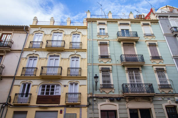 Golden hours shot of neighborhood in Valencia, Spain. High resolution 42Mp outdoors digital capture taken with Sony A7rII and Canon EF 70-200mm f/2.8L IS II USM Telephoto Zoom Lens