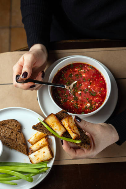 istock Ukrainian dish. Borscht with meat and sour cream. 2155693109