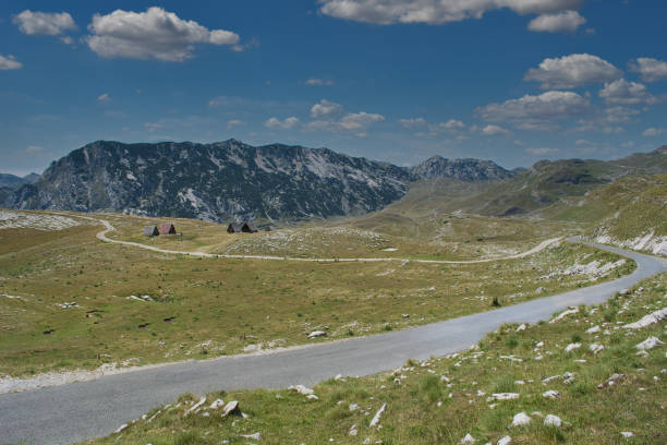 istock road in the albanian alps 2155695771