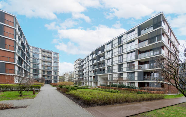 istock Modern Apartment Buildings with Green Landscaped Courtyard 2155701692