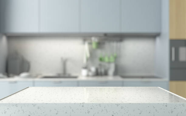 istock Marble podium for presentation on the background of  blurred light kitchen 3d render 2155701975
