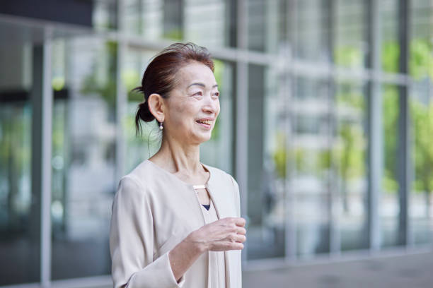 istock Senior female president working in an office district in spring 2155702879