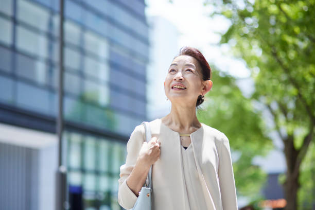 istock Senior female president working in an office district in spring 2155703027