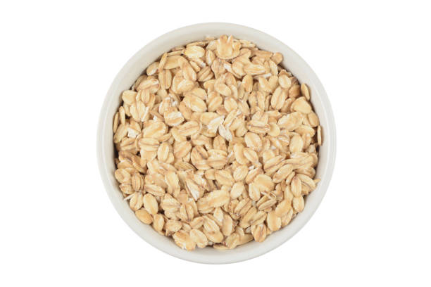 istock Oat flakes in a porcelain bowl 2155703139