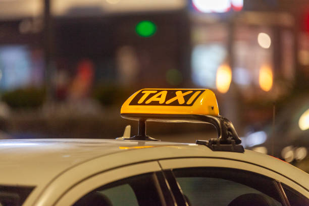 istock Illuminated yellow Cypriot taxi sign 2155705561