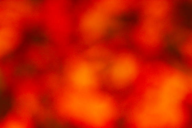 Blurred abstract texture of a burning flame flickering with heat waves.