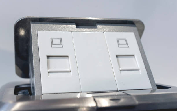 istock Closeup of a pop up floor LAN or data socket with 2 RJ45 ports. 2155706202