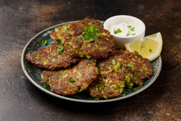 istock Fried Broccoli fritters or pancakes with parmesan and mozzarella cheese 2155706417