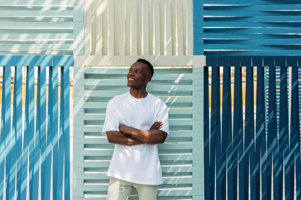 istock American guy enjoying a summer day outdoors 2155708582