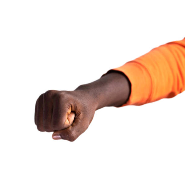 istock Fisted hand in orange sweater giving a punch, fist over white background 2155709619