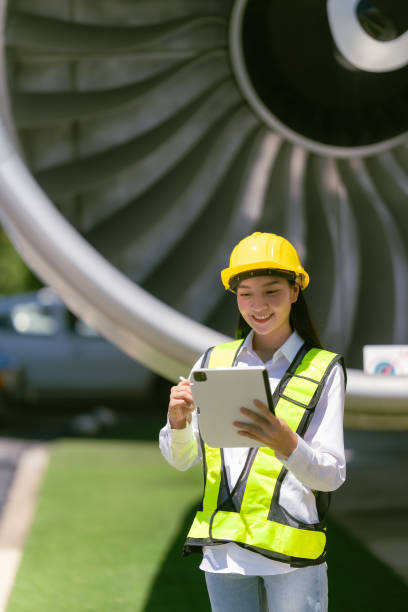 istock Airplane engine repair technician, aerospace engineering woman, engine inspection, maintenance technician 2155713190