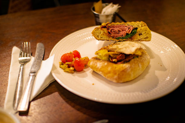 freshly made snack in a market in ireland based on some kind of meat and vegetables in bread