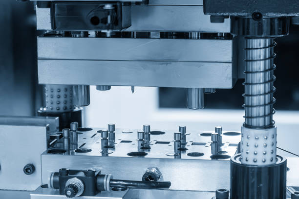 istock The metalworking process by progressive die in the light blue scene. 2155719272