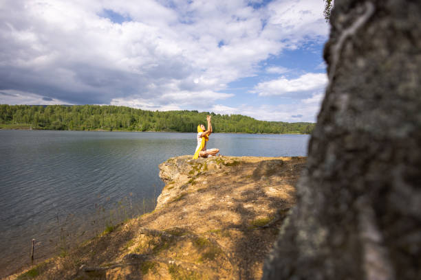 istock Meditating by the Water 2155727161