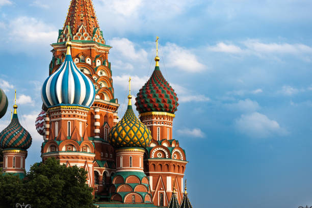 istock St. Basil's Cathedral Domes and architectural details. Shoot at golden hour against dramatic clouds and sky. Russia, Moscow 2155727299