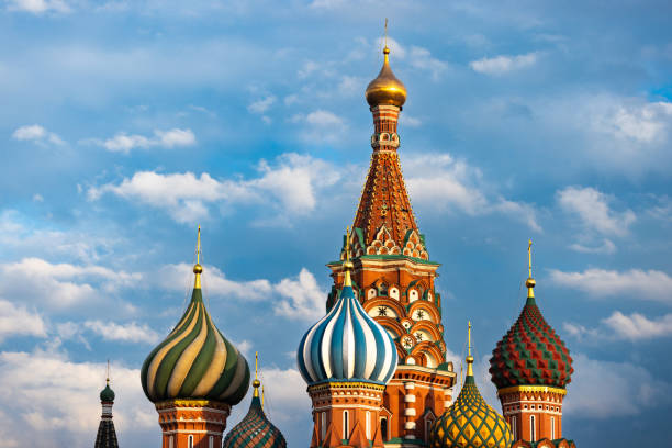 St. Basil's Cathedral Domes and architectural details. Shoot at golden hour against dramatic clouds and sky. Russia, Moscow