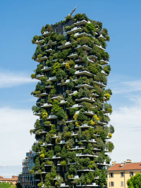 Milano, Italy. Bosco Verticale. Amazing view at the modern and ecological skyscraper with many trees on each balcony. Modern architecture, vertical gardens, terraces with plants