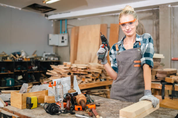 istock professional artisan carpenters woodworking team work together creatively, creative carpenter woman working workshop for wooden craft with wood tool at industry carpenter's shop, business of wood 2155727434