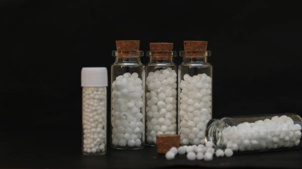 istock Homeopathy medicines. Bottles and pills. 2155728808