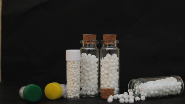 istock Bottles with Homoeopathic pills. 2155728812