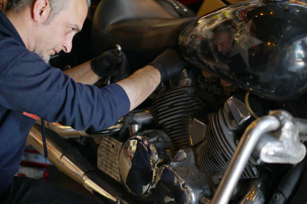 istock A man in the garage is checking a motorcycle 2155731056