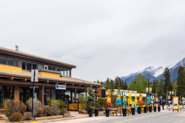 Alberta, Canada - May 21, 2024 : A charming town located in Alberta Canada, nestled in the Canada Rockies near eastern entrance of Banff national park offering panoramic views of surrounding mountains.