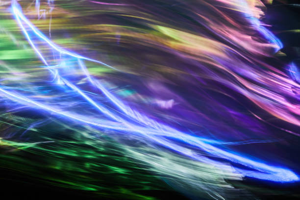 istock Abstract flowing neon wave colored lights background. Long exposure photography by light painting technique. Multicoloured light painting photography. 2155748964