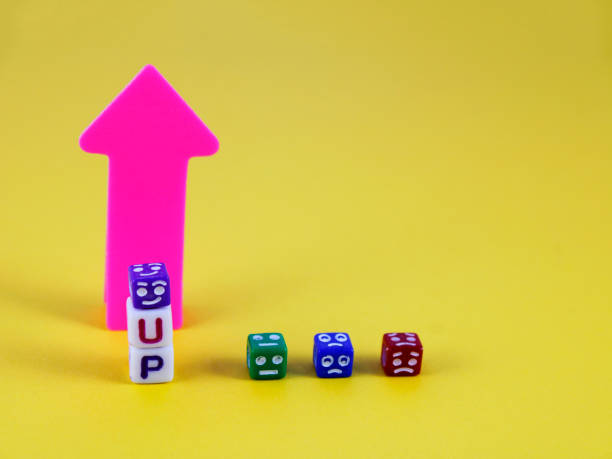 istock Happy cube on word up and arrow next to other cubes with sad expressions 2155749979