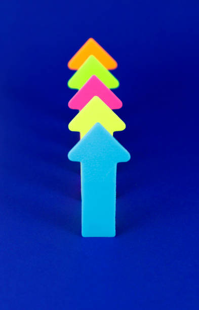 istock Arrows of different colors arranged in a row - vertical format 2155750853