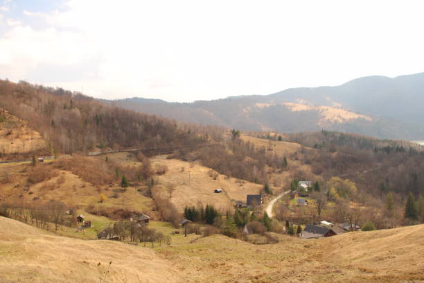 istock A landscape with hills and houses 2155753263