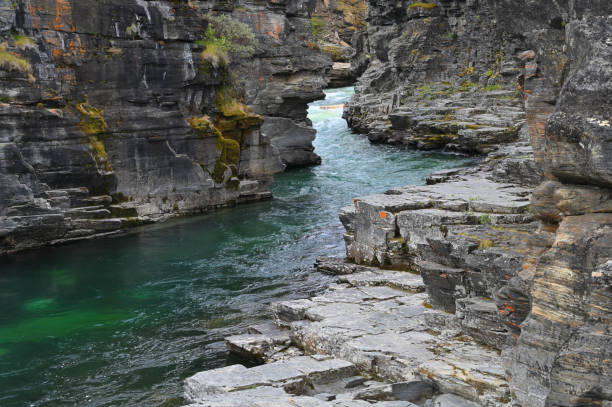 The pool of waterfall flow on the rocks, the current is very small