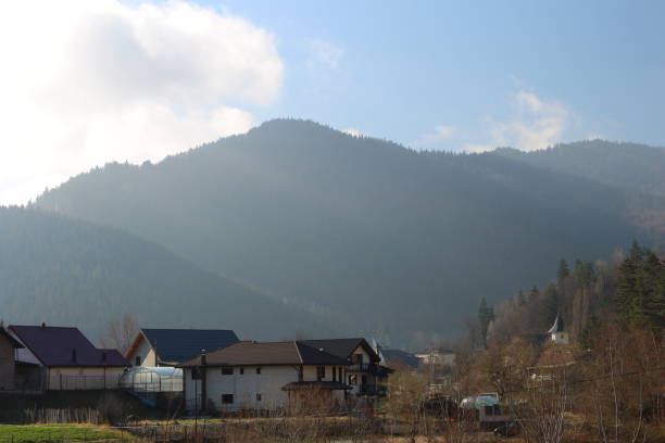 istock A group of houses in front of a mountain 2155754638