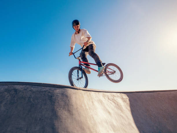 istock BMX bicycle rider performing Footjam trick 2155755274