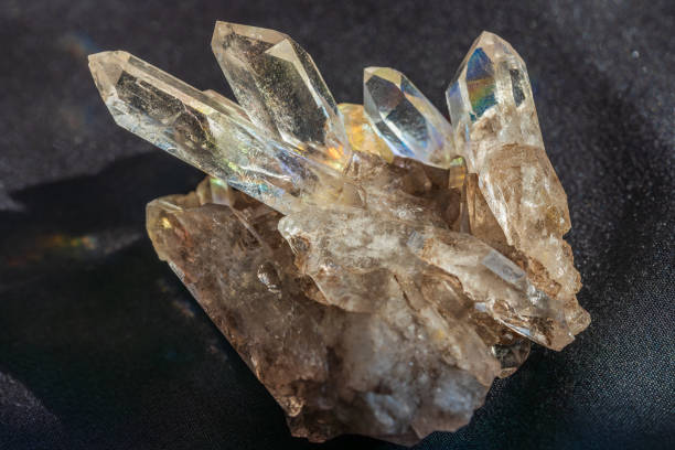 istock natural clear quartz crystal geologic formation in sunlight 2155757976