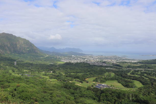 istock Scenic Valley Overlooking Coastal Town 2155758216