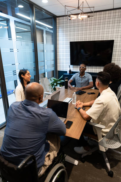 istock Disability, diversity and business meeting with staff,  team planning on corporate strategy 2155758440